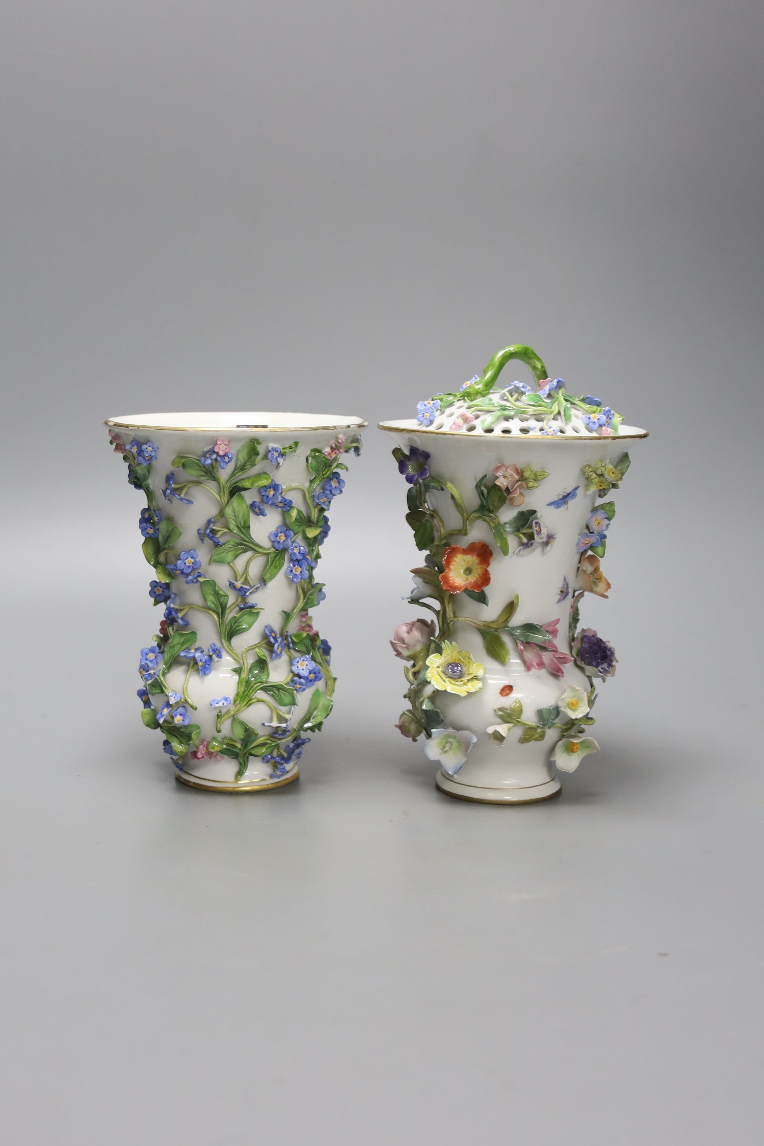 Two similar 19th century Meissen pot pourri vases and one cover, tallest 20cm